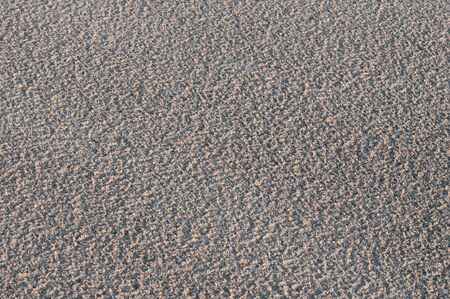 sandy texture of the pebble beach.の写真素材