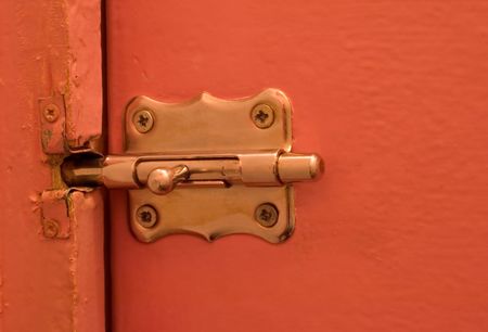 Old hause, old metal door catch. lock