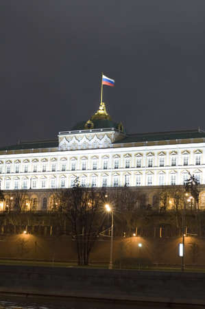 Russia, city Moscow, night  Kremlin wall and tower with Russian flagの写真素材