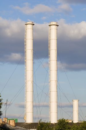Russian Moscow factory chimney on blue skyの写真素材