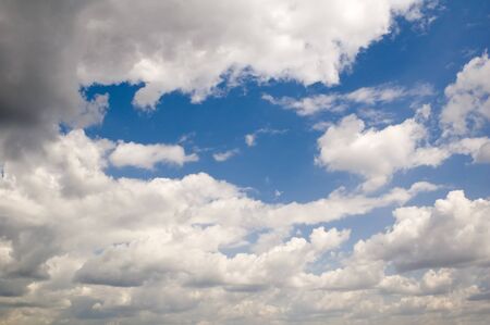 leaden clouds. grey clouds and blue sky