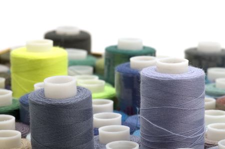 object on white: spool of thread