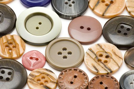 object on white sewing tool dress button