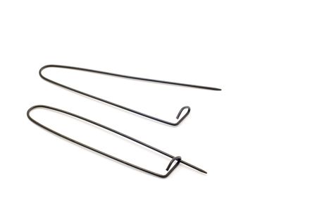 object on black - tool safety pin