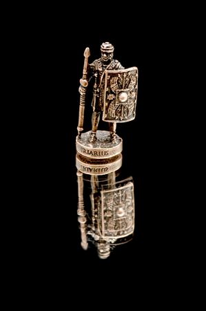 object on black - toy knight on blackの写真素材