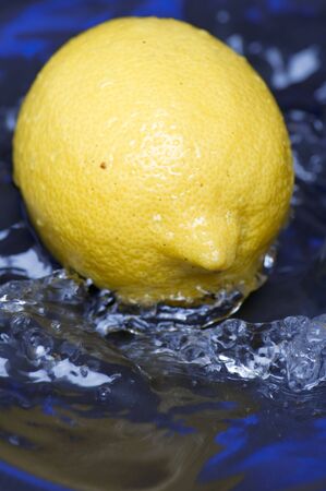 object on blue - food lemon in the waterの写真素材