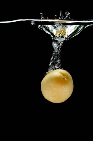 object on black - food Apricot in waterの写真素材