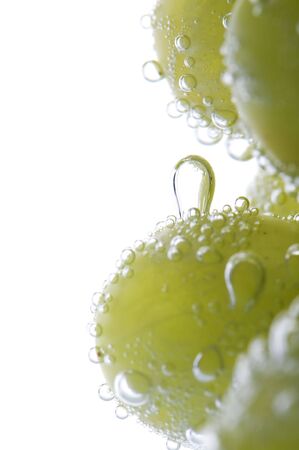 object on white - Green grapes in waterの写真素材