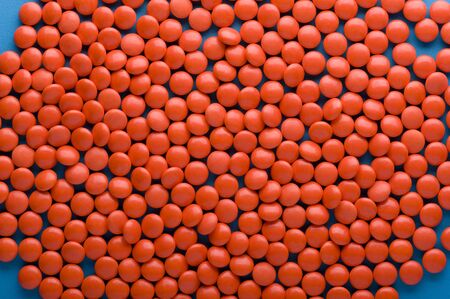 object on blue- Medical tablet close up