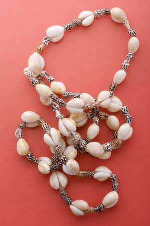 object on red - costume jewel close upの写真素材