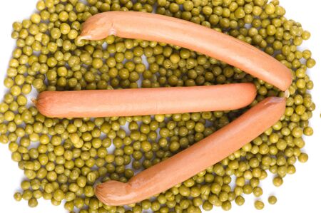 object on white - food green peas with frankfurterの写真素材
