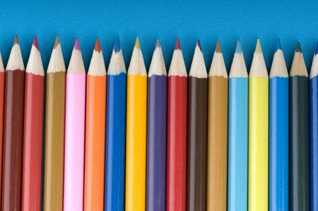 object on blue - Colored crayon close upの写真素材