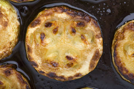 object on black - food fried marrow close upの写真素材