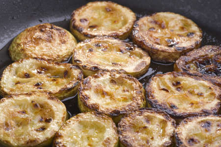 object on black - food fried marrow close upの写真素材