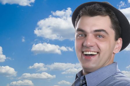 people blue sky - men on hatの写真素材