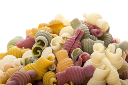object on white - food colored pasta close upの写真素材