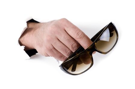 object on white - man hand with sunglasses