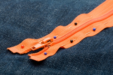 stitch zipper on blue jeans close uo の写真素材