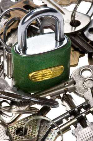 object on white - tool padlock with key close up