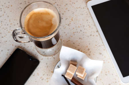 cup of coffee with vanilla and canellaの写真素材