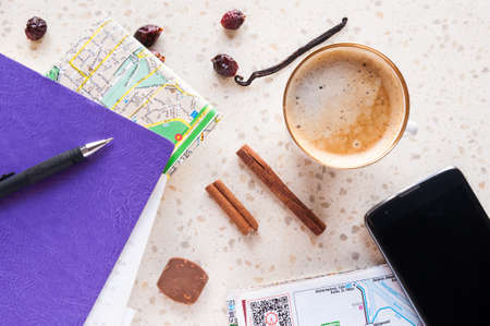 cup of coffee with vanilla and canella map of cityの写真素材