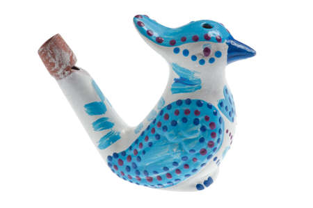 whistle in the shape of a bird on whiteの写真素材