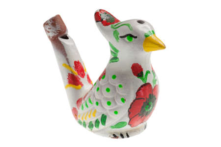 whistle in the shape of a bird on whiteの写真素材