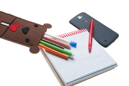 case for pens and phone in the form of a bear on whiteの写真素材