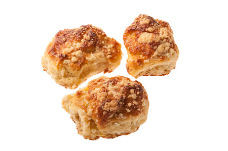 Sweet puff pastry bun isolated on white backgroundの写真素材