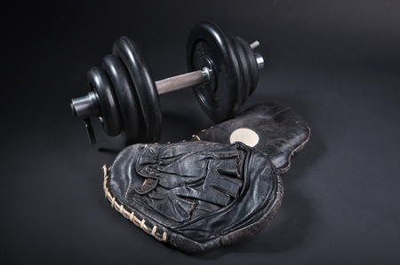black older punch pads for boxing training on dark backgroundの写真素材