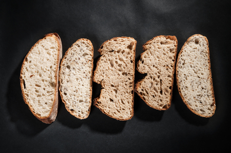 sliced bread with on a dark backgroundの写真素材