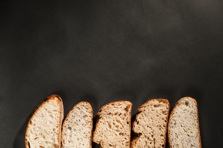sliced bread with on a dark background
