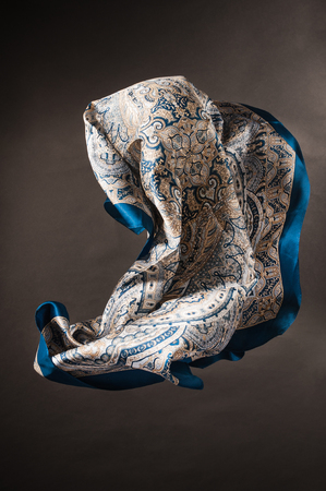 flying female headscarf on black backgroundの写真素材