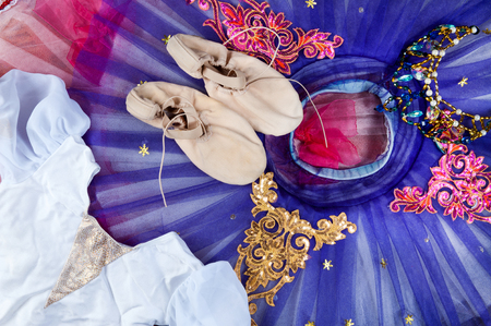 ballet flats and dance skirt on dark backgroundの写真素材