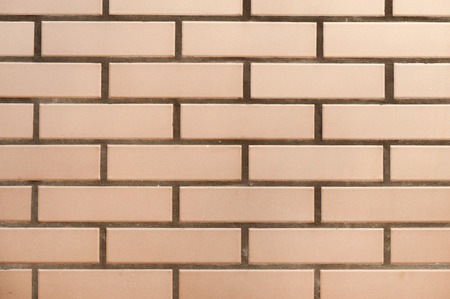 light brick masonry wall with cement