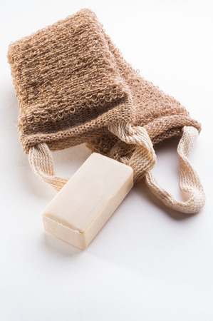 washcloth with white soap on white backgroundの写真素材
