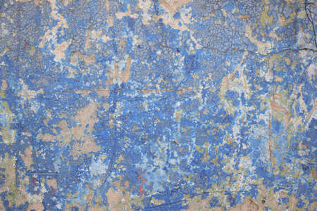 Old blue paint on old photo wall for backgroundの写真素材