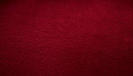 Red fabric texture background for designの写真素材