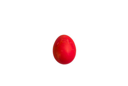 Red egg for Easter holiday on a white background isolateの写真素材
