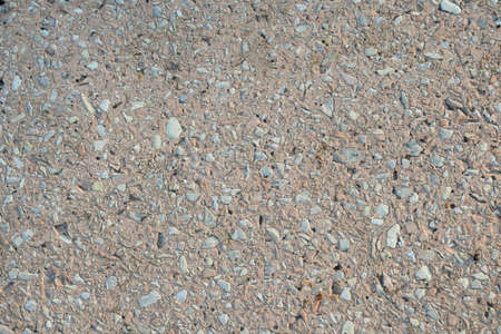 Stone texture background small stones in cement floor