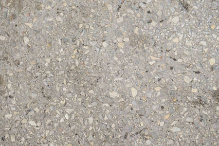 Stone texture background small stones in cement floorの写真素材