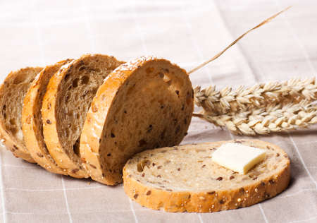 Tasty piece of bread with butter 