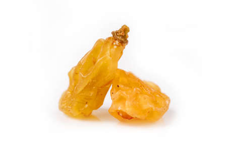 Pile of healthy raisins isolated on white backgroundの写真素材