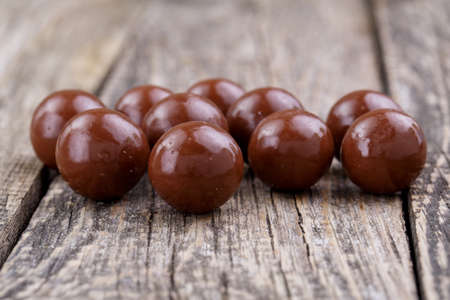 Delicious chocolate candies on a white .の写真素材