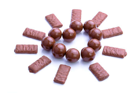 Delicious chocolate candies on white background.の写真素材