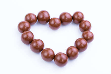 Delicious chocolate candies on white background.の写真素材