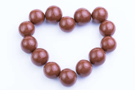 Delicious chocolate candies on white background.の写真素材
