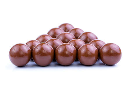 Delicious chocolate candies on white background.の写真素材