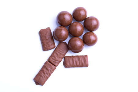 Delicious chocolate candies on white background.の写真素材