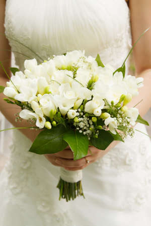 Beautiful brides wedding flowers and wedding dress.の写真素材